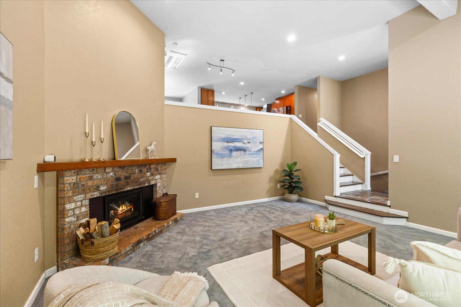 Open to the kitchen and dining room.