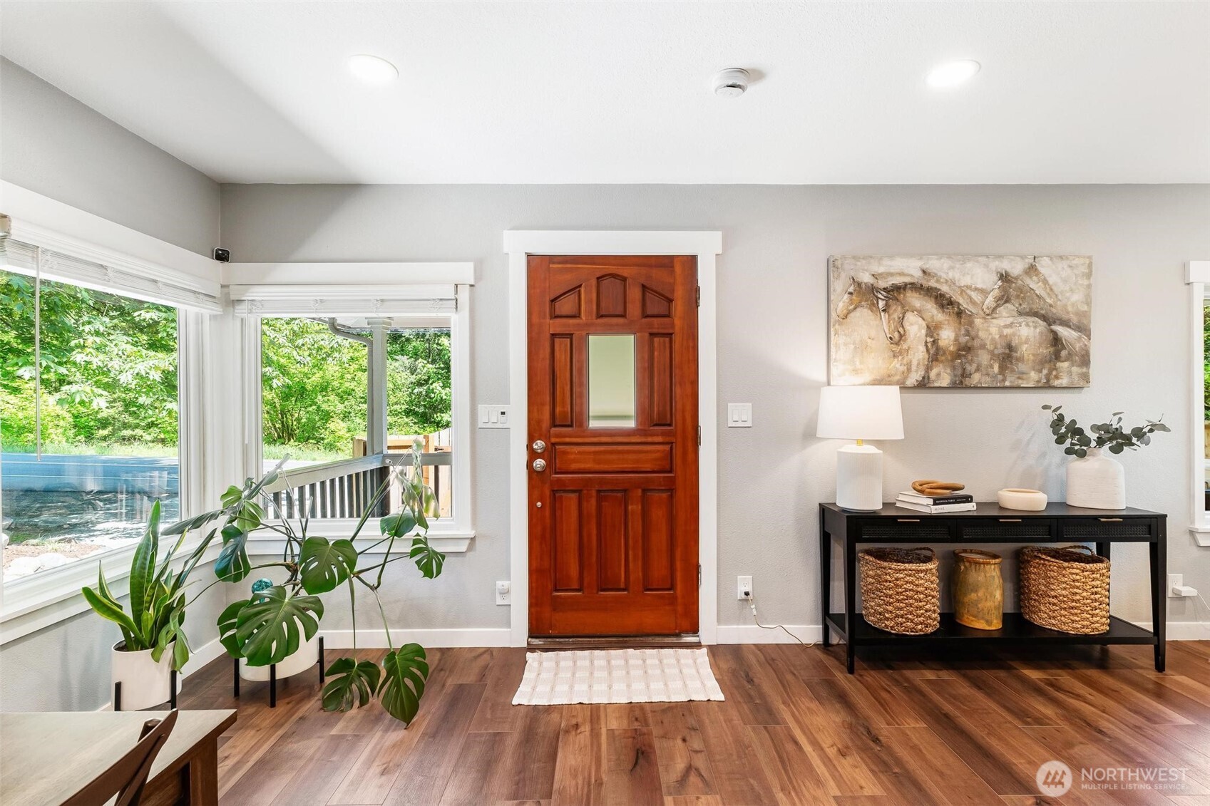Inviting covered front porch perfect for relaxing.