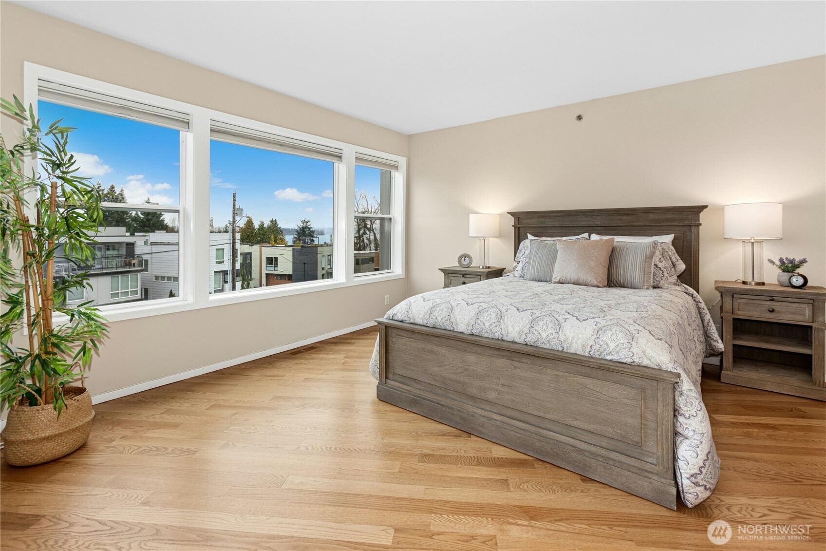 This primary suite has this space which is perfect for relaxing with a glass of wine while you enjoy the lake views.