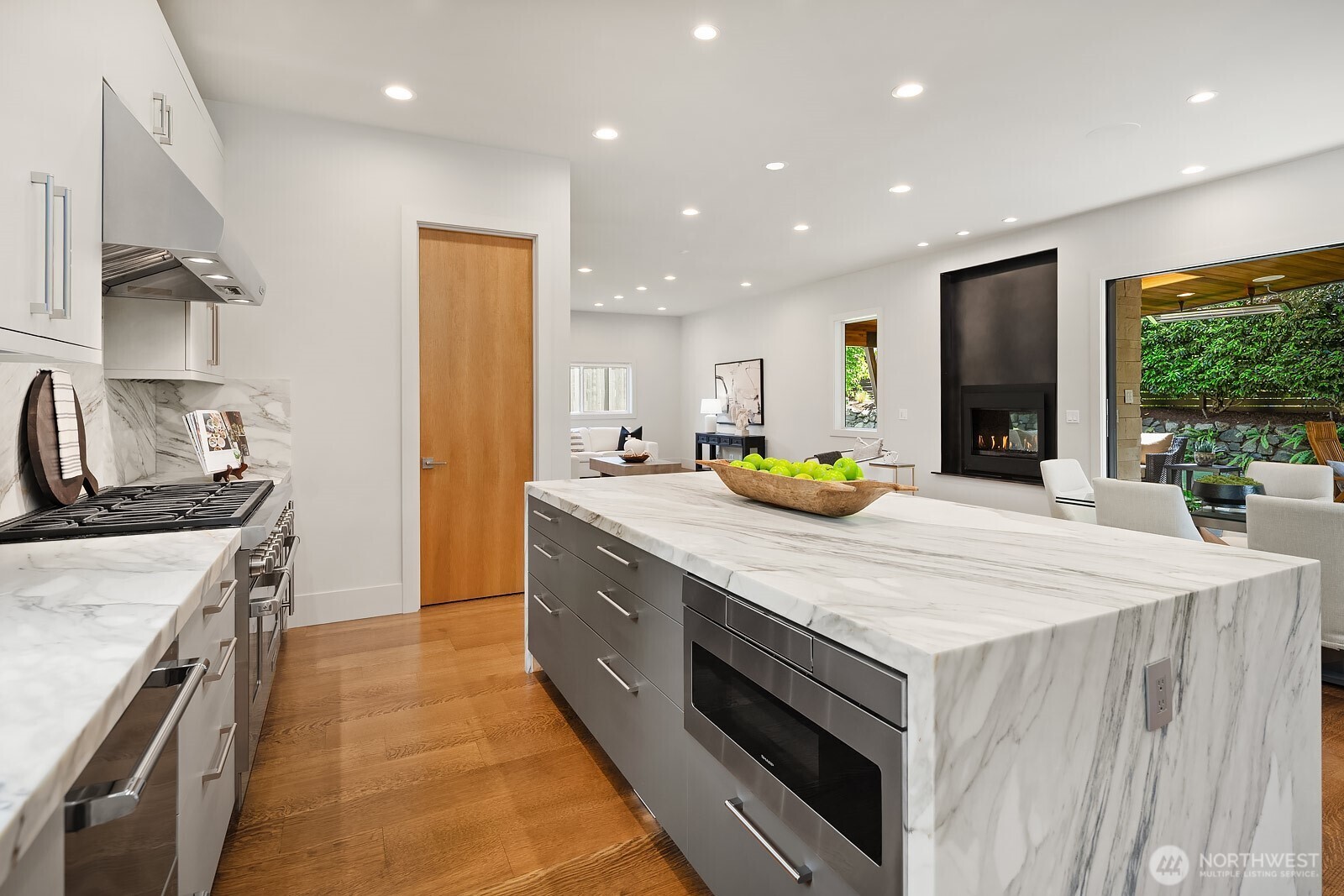 Walk-in pantry, custom cabinets, and island is the centerpiece of the kitchen.