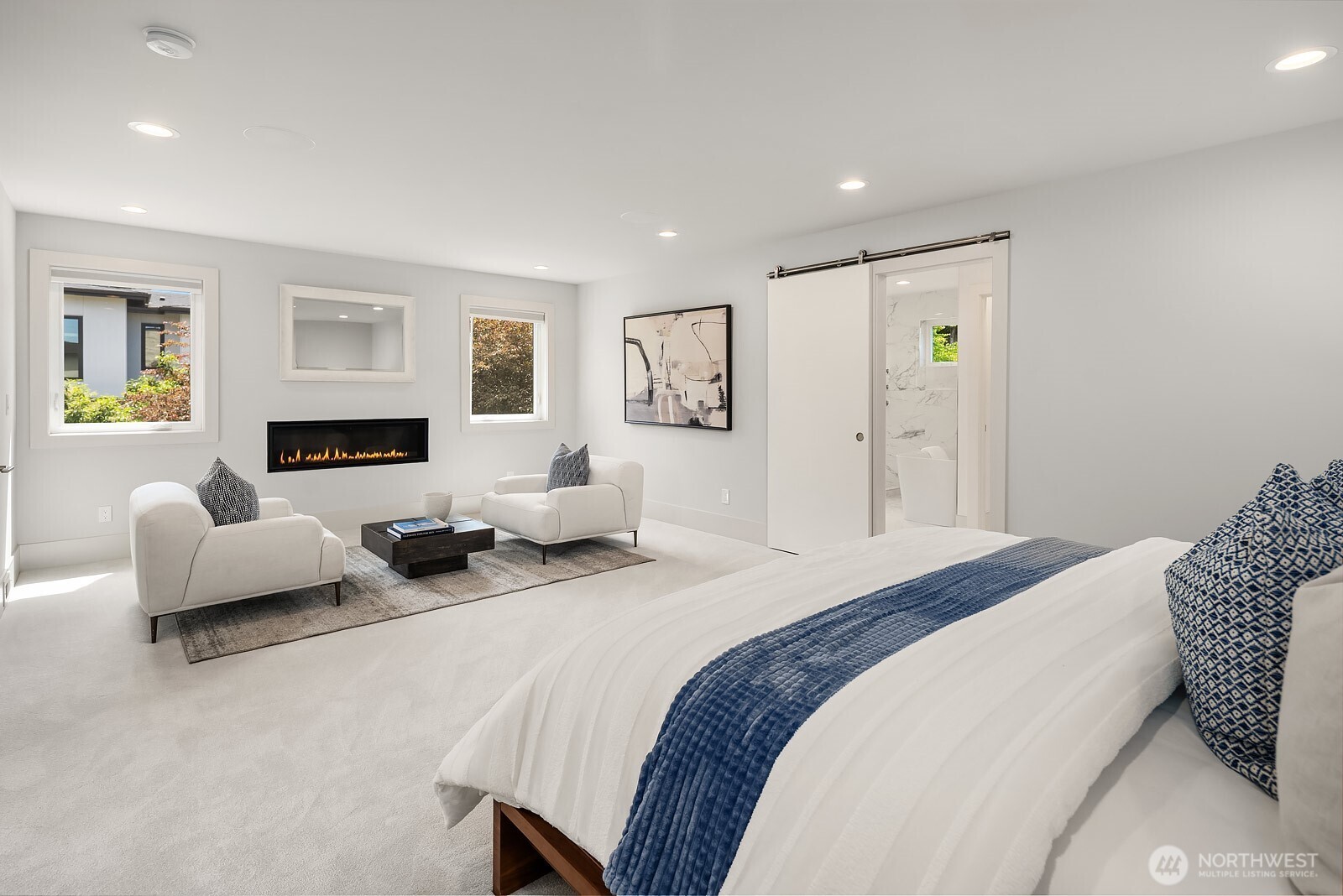Upper level primary suite has brand new luxury carpet