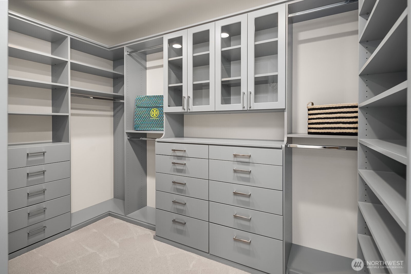 Spacious custom walk-in closet in upper-level primary suite