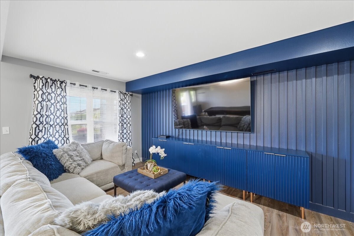 Recently updated family room with woodwork details throughout