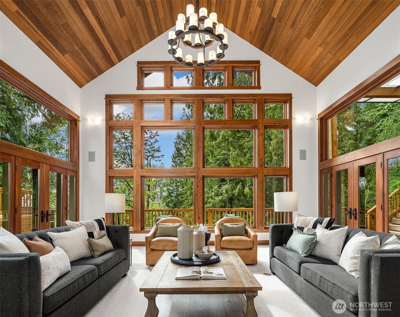 GIANT double doors + solid wood beam porte cochere entry.