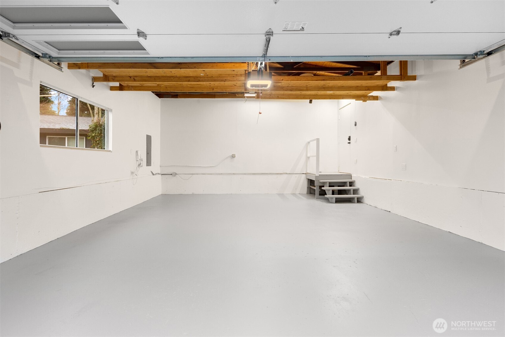 2 Car Garage: Brand new garage door. Freshly painted garage floor and walls.