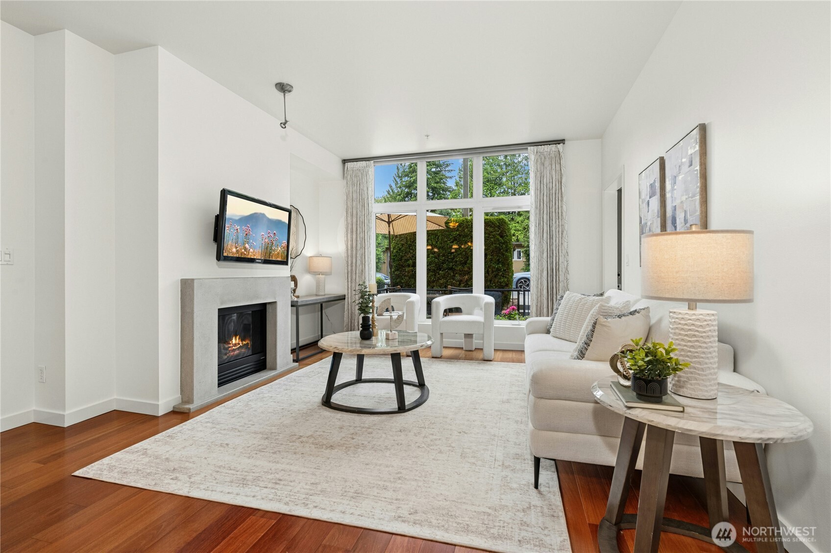 Lovely living room looking out to patio.