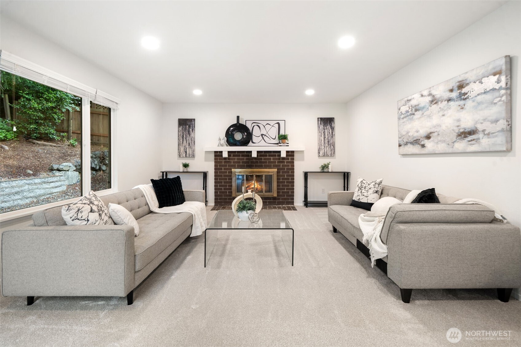 Good sized recreation room right off kitchen eating room - fresh carpets, new windows & cozy fireplace