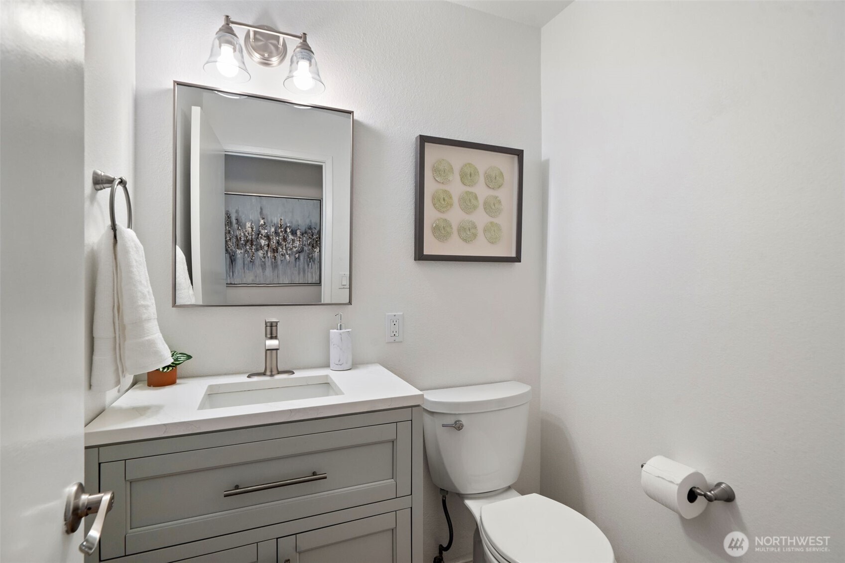 Main level half bathroom - newly updated & painted