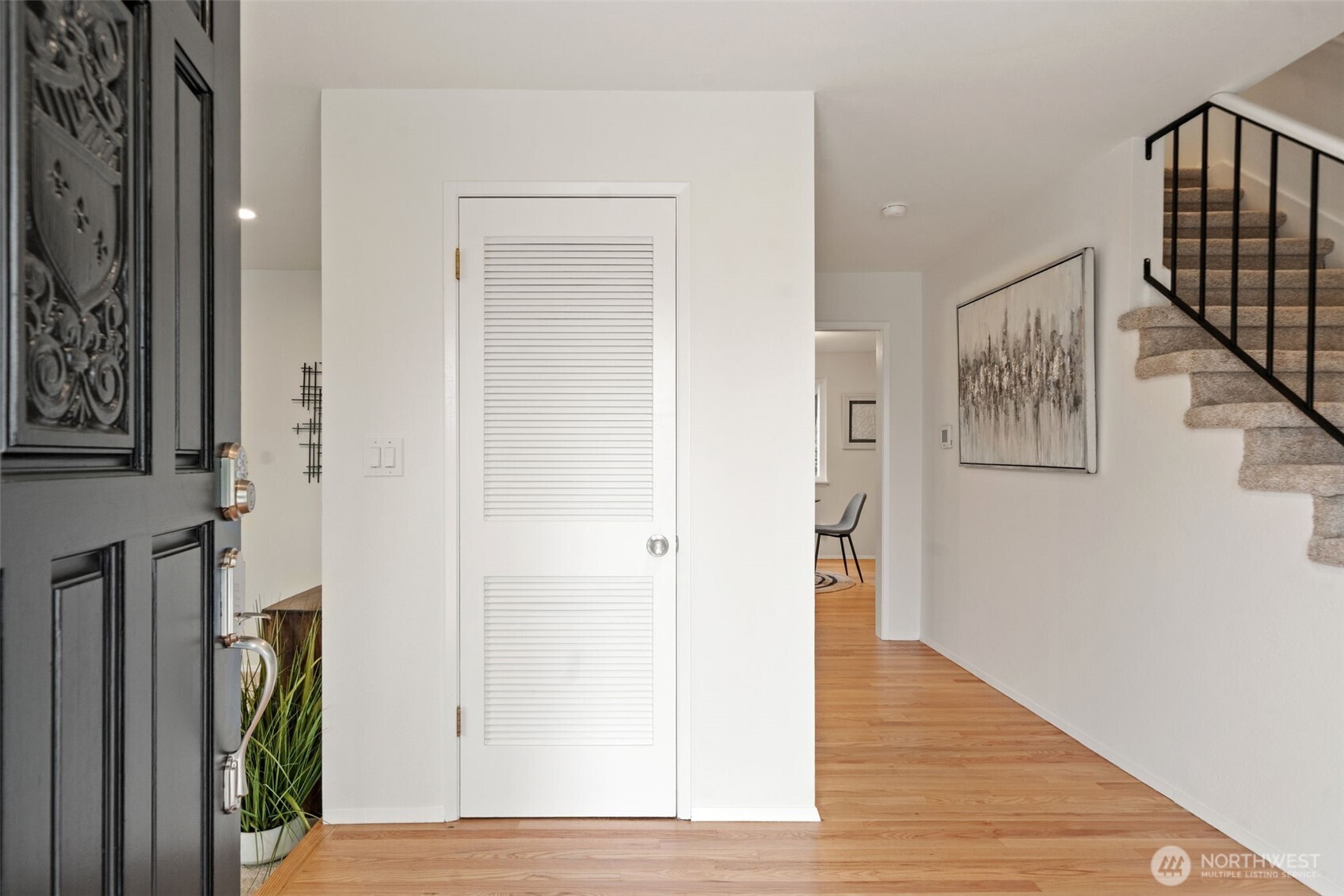Entry Foyer - Freshly refinished hardwood floors, paint & carpet
