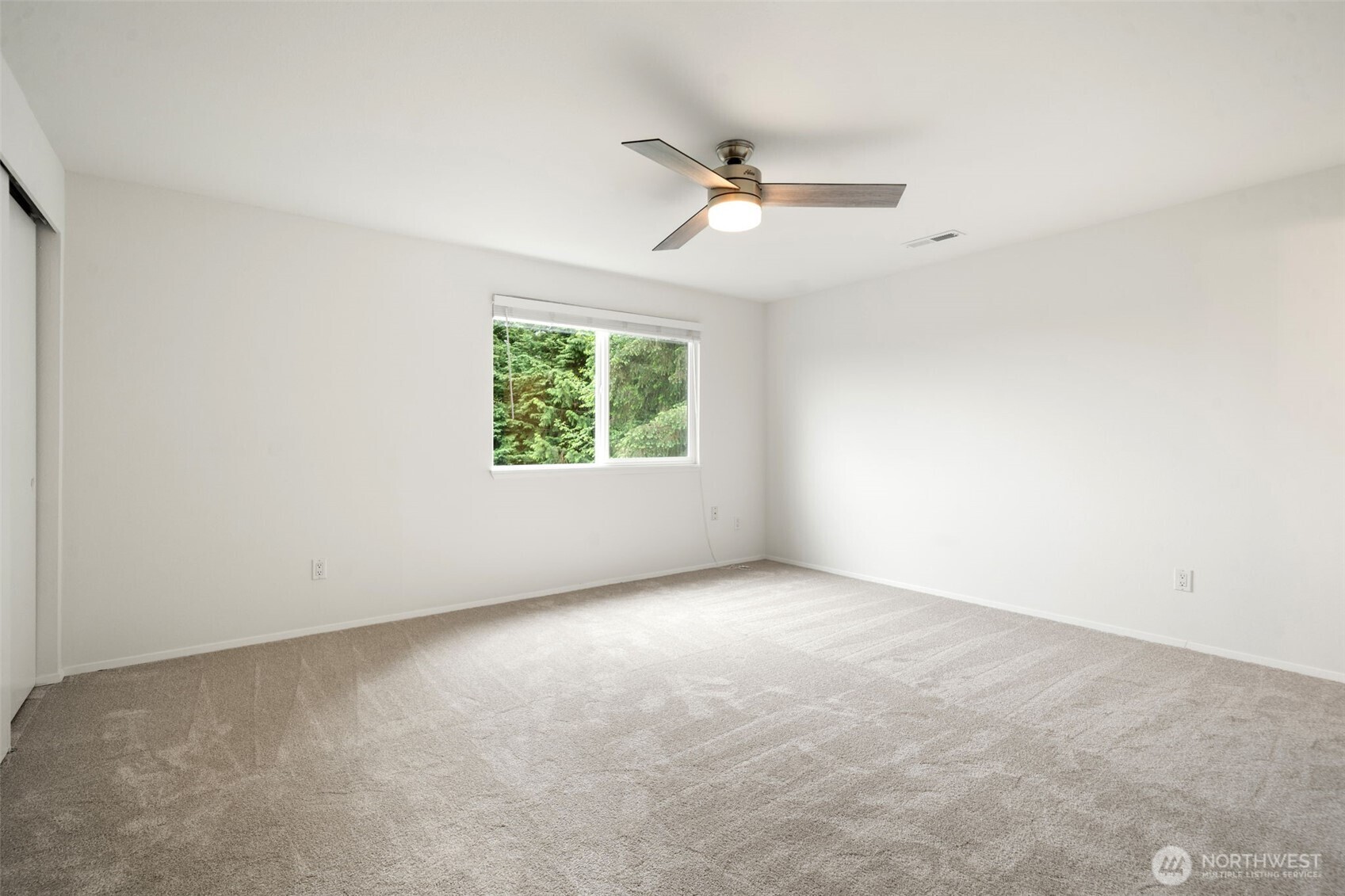 2nd level bedroom shown without virtual staging in place