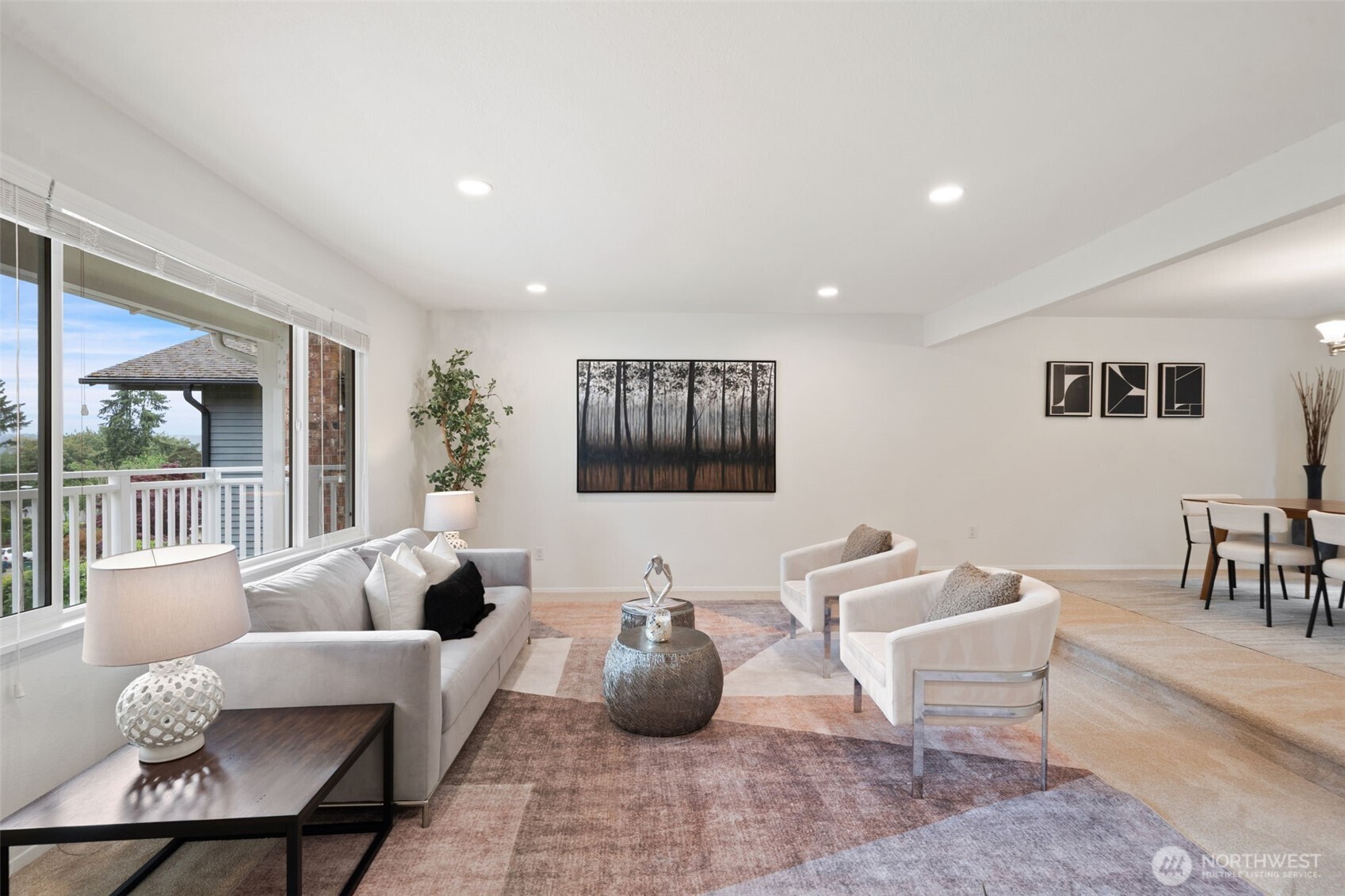 Generous living room with large windows to the mountains - new canned lighting, fresh paint & carpets