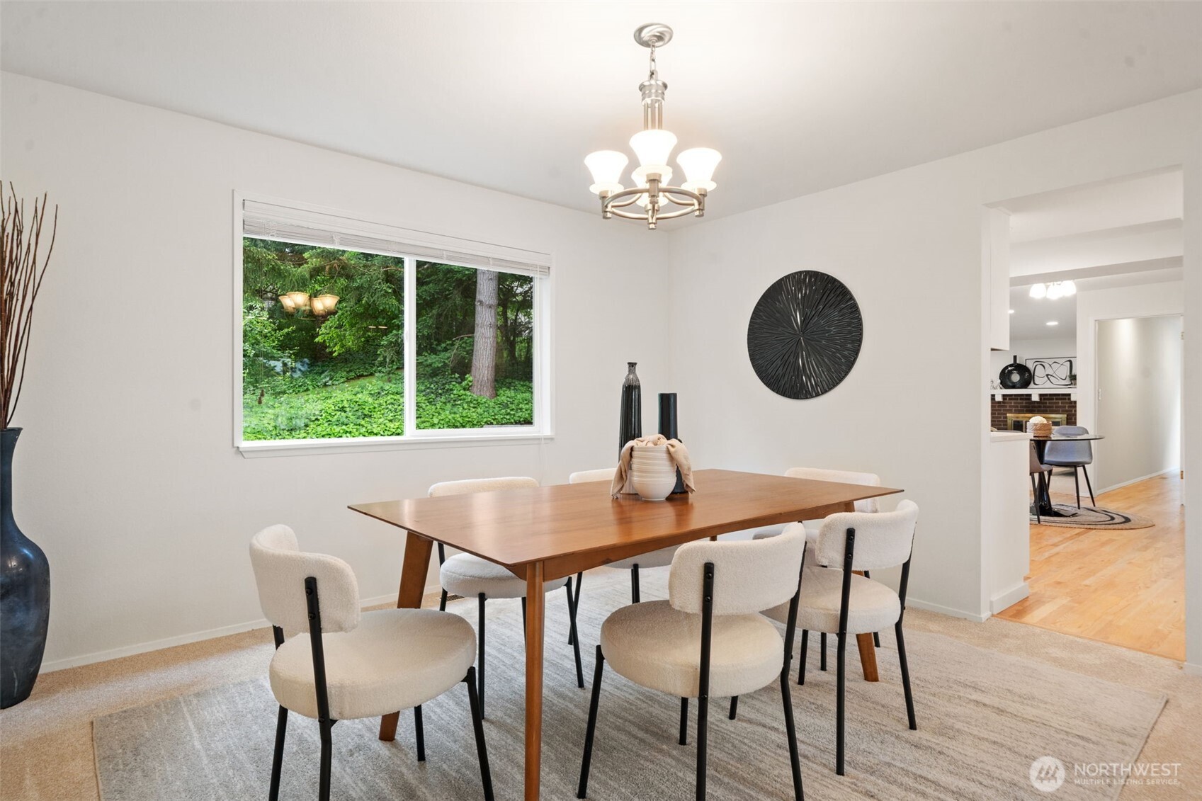 Dining room with open air feeling to nature and the spacious living room