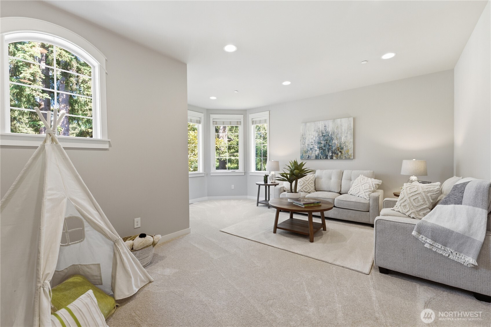 Upstairs bonus room that works beautifully as a TV room, rec room, large office, or anything you imagine