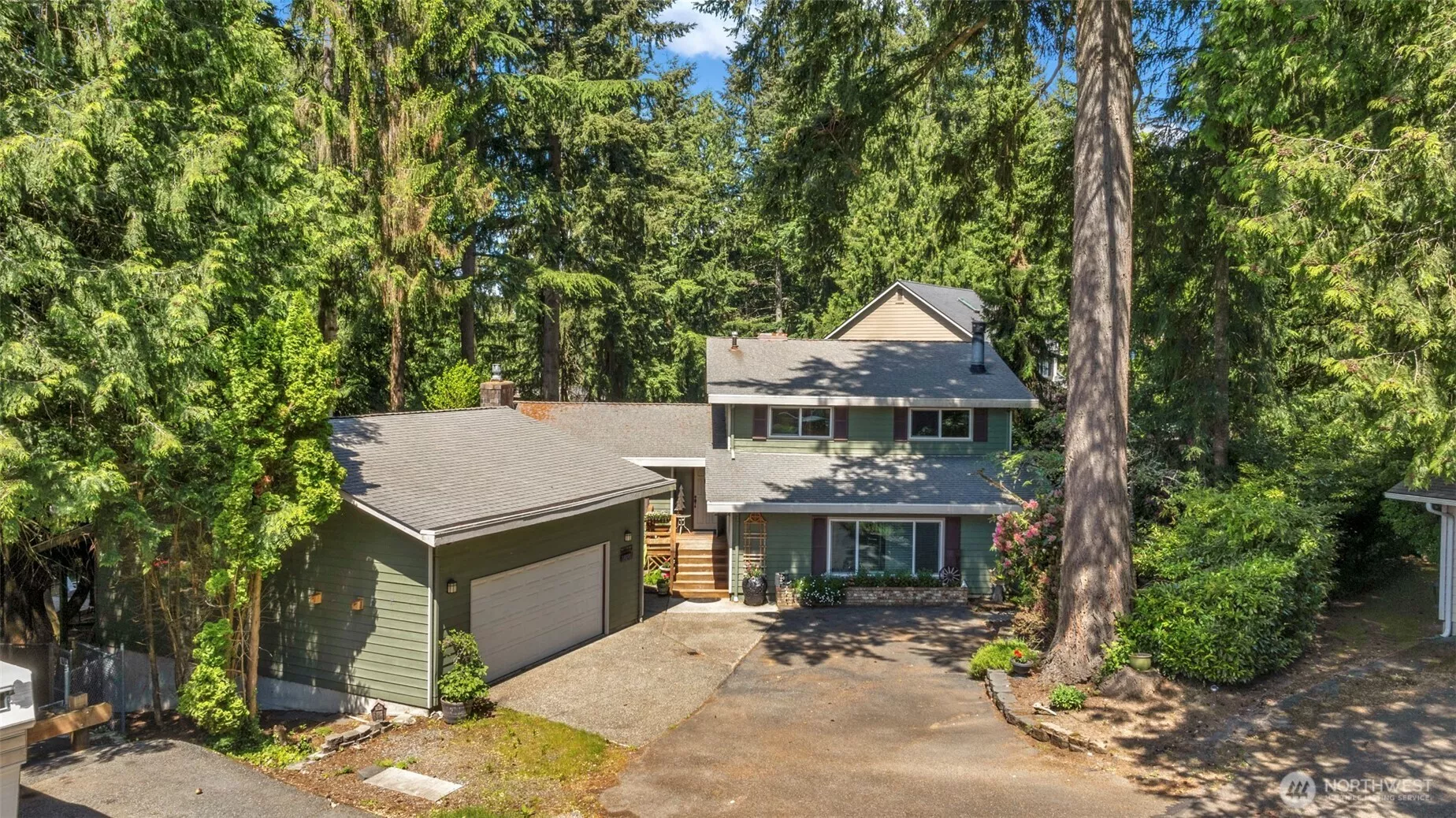 looking north at the house and 750 sq ft garage.