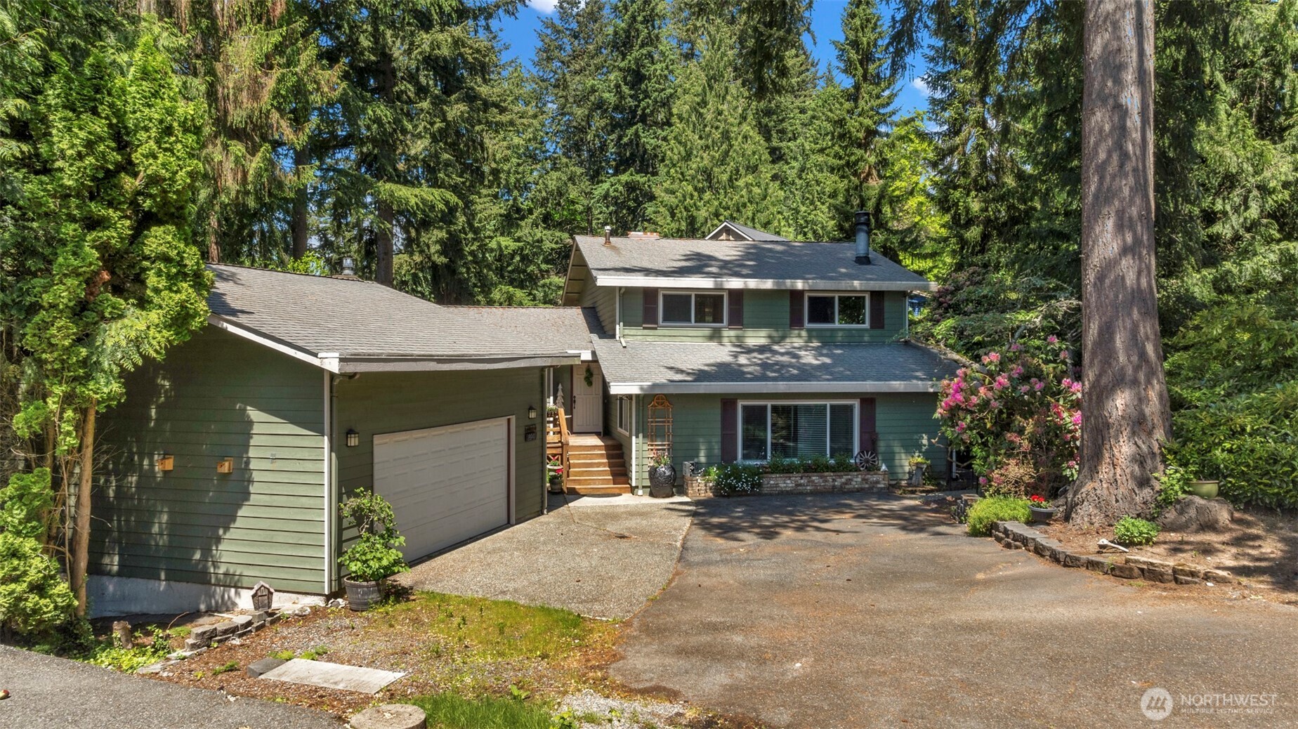 looking north at the house and garage