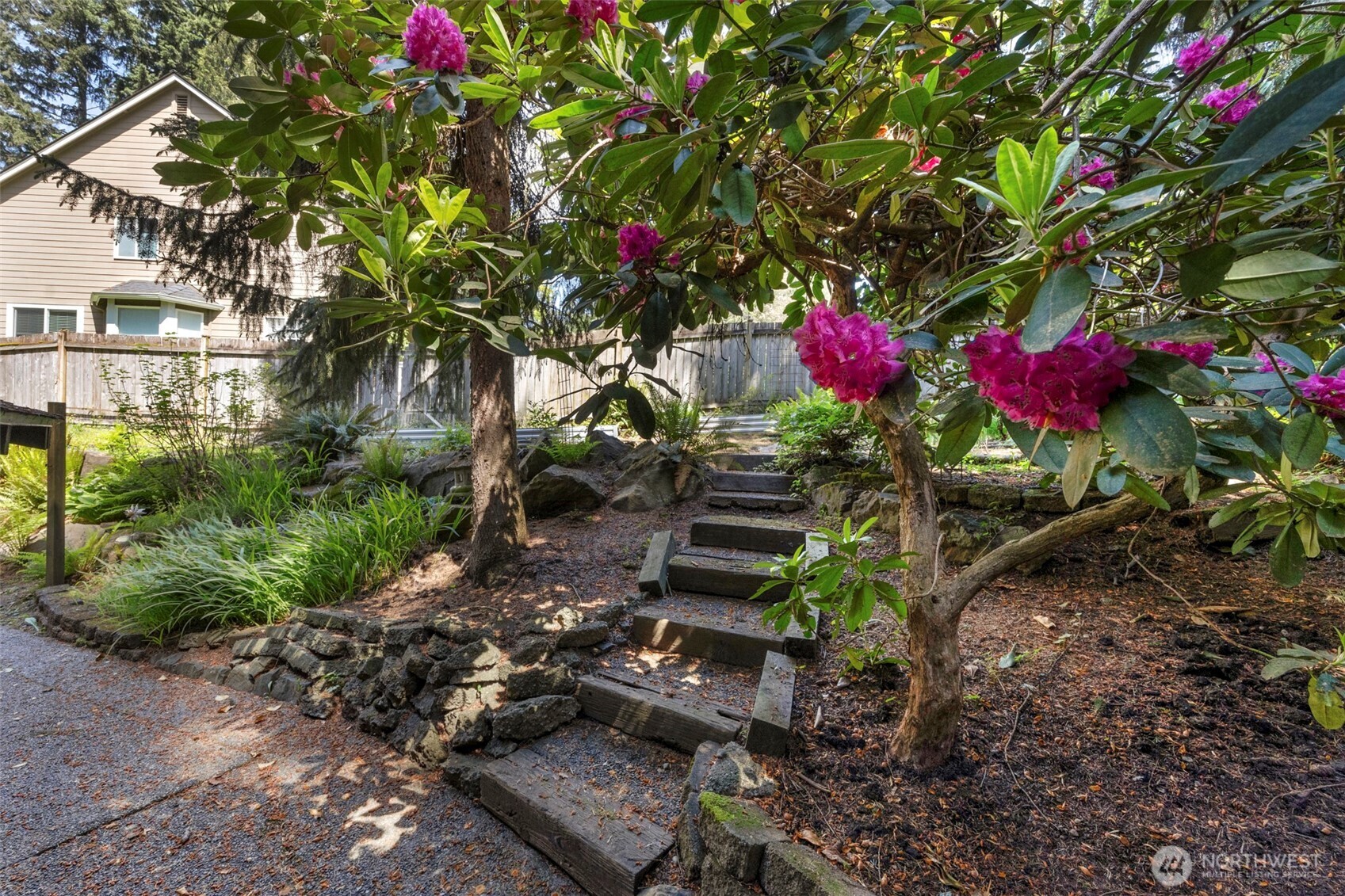 Area near patio with planting spaces.
