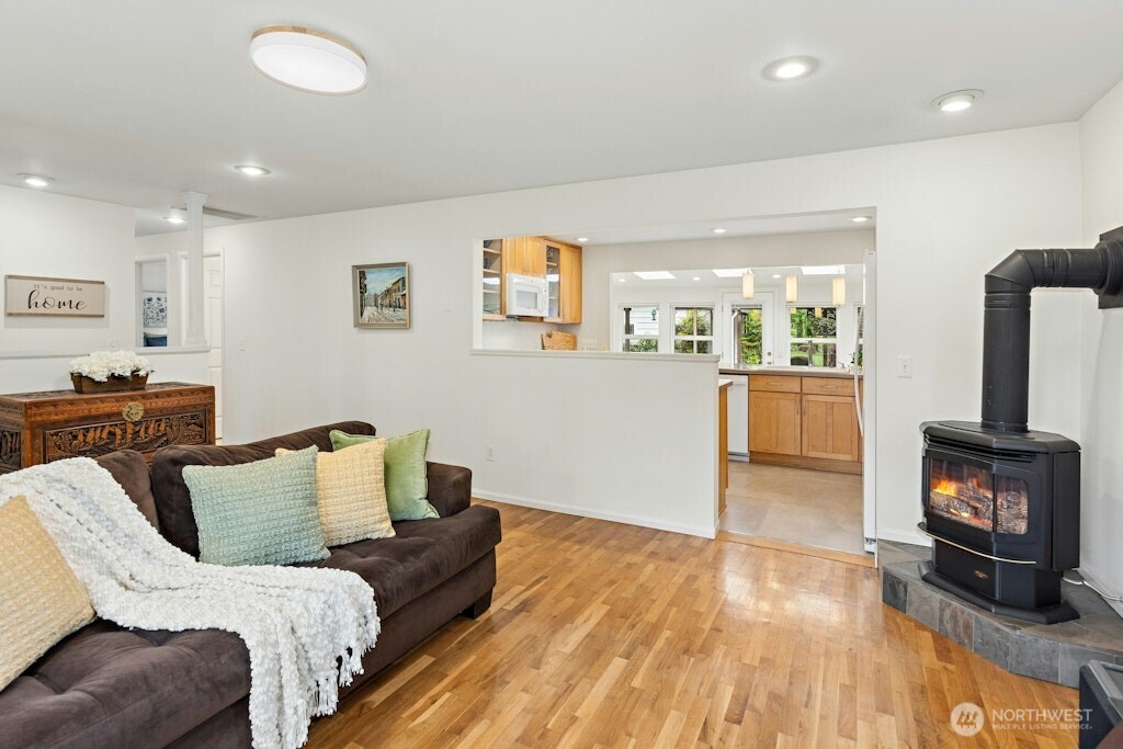 Light and bright family room is open to the kitchen and sunroom/dining areas