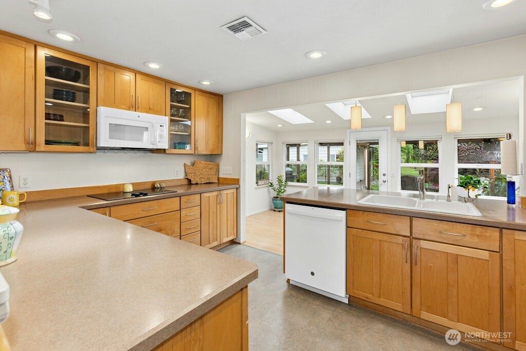 Beautiful maple cabinetry in the gourmet kitchen