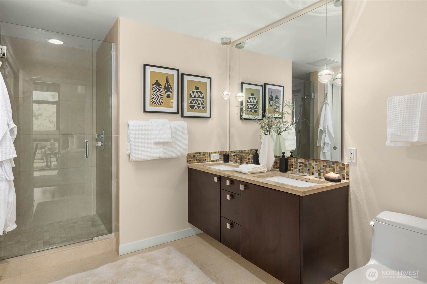 Tons of space in this oversized ensuite bathroom with dual sinks & spacious shower