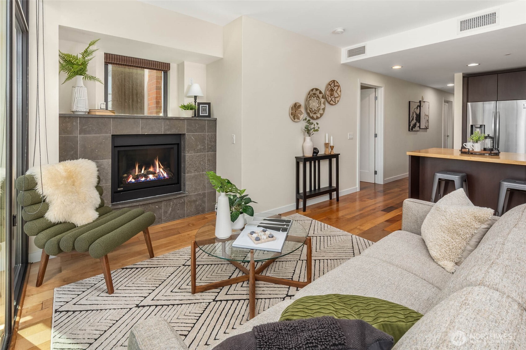 Designed for today’s modern lifestyle, this stylish end-unit offers an inviting open-concept layout where the kitchen, dining, and living spaces flow effortlessly together.