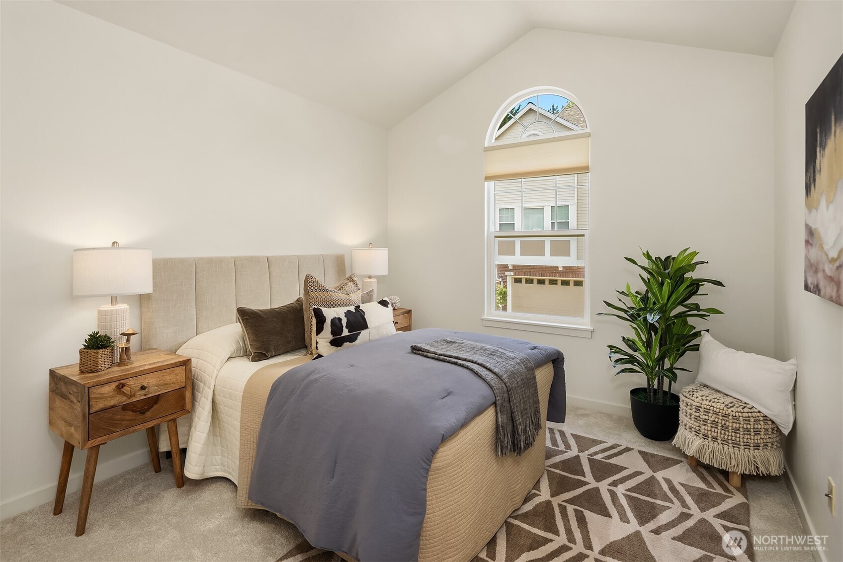 The secondary bedroom overlooks the front of the home.
