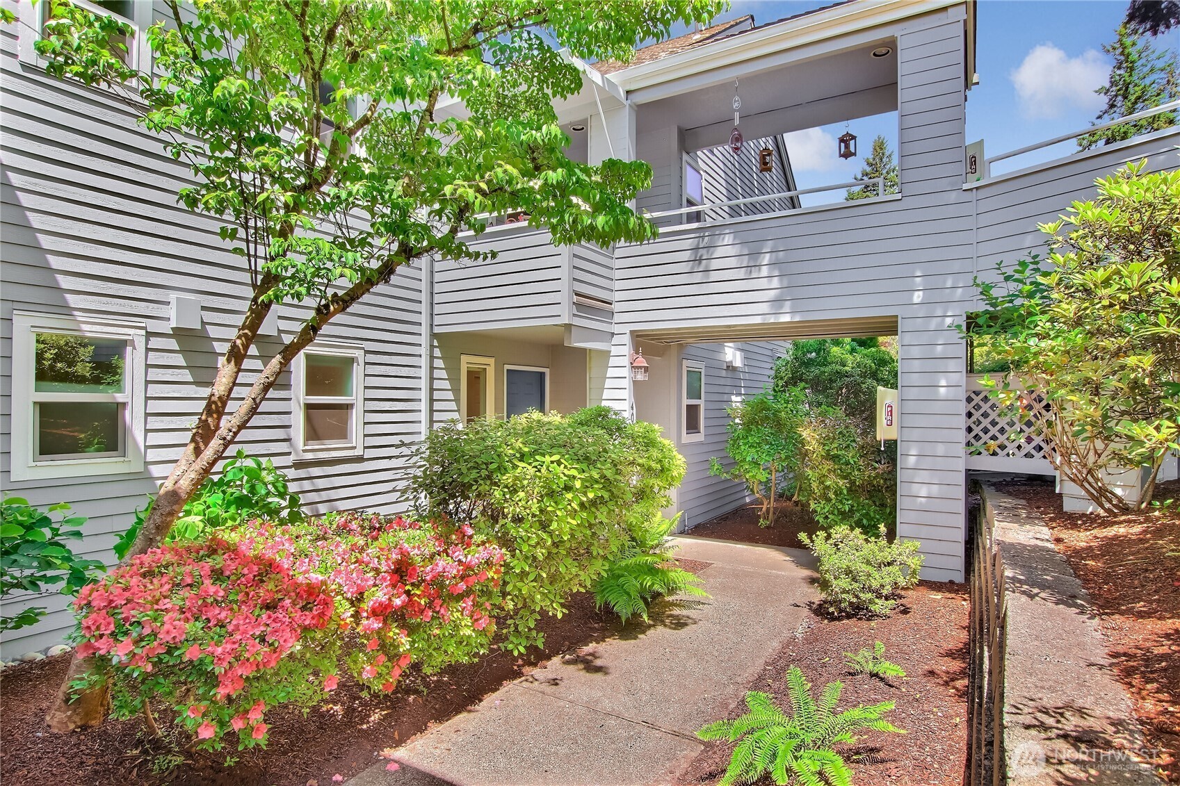 One level, no stairs. Very private end unit. Short walk to garage.