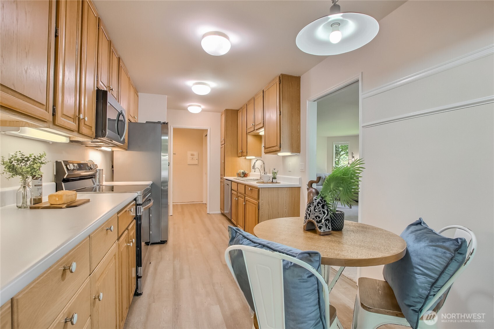 Kitchen flows easily to living/dining areas.
