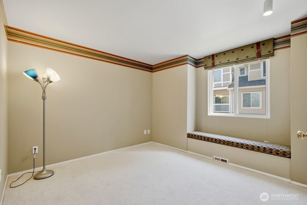Large guest bedroom #1 with window seat and large closet!
