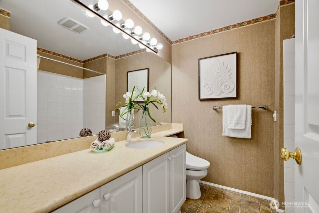 Large, serene primary suite is located at the back of the unit so it faces the forest!