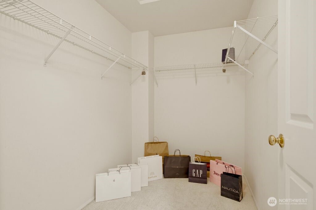 Large corner unit with all bedrooms upstairs!