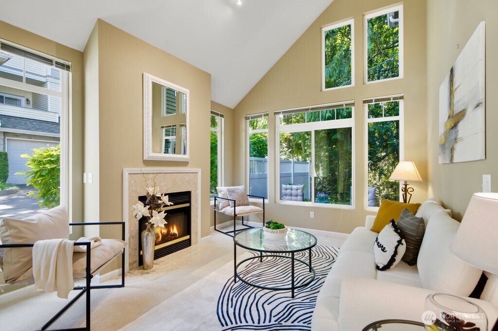 Light and open living room with fireplace!