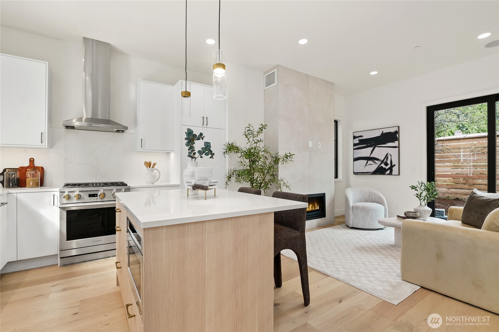Open, Spacious Floor Plan with High Ceilings, Custom Oversized Windows and Kitchen Island providing additional Counter/Cabinet Space