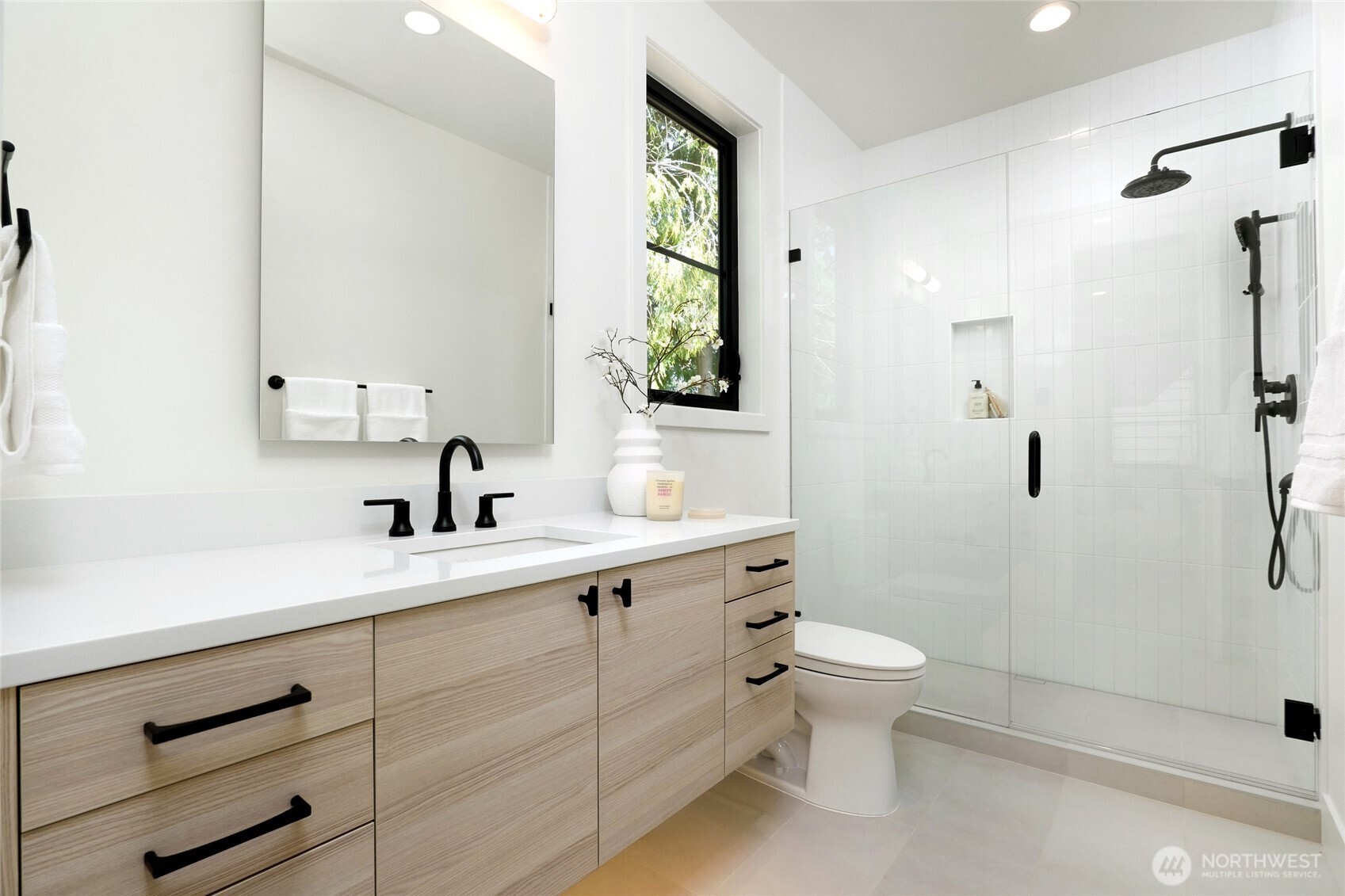 Primary Suite Bath with Floating Cabinet, Sensor Lighting and Luxury Seamless Glass Shower with Hand Held and Built-In Shelf