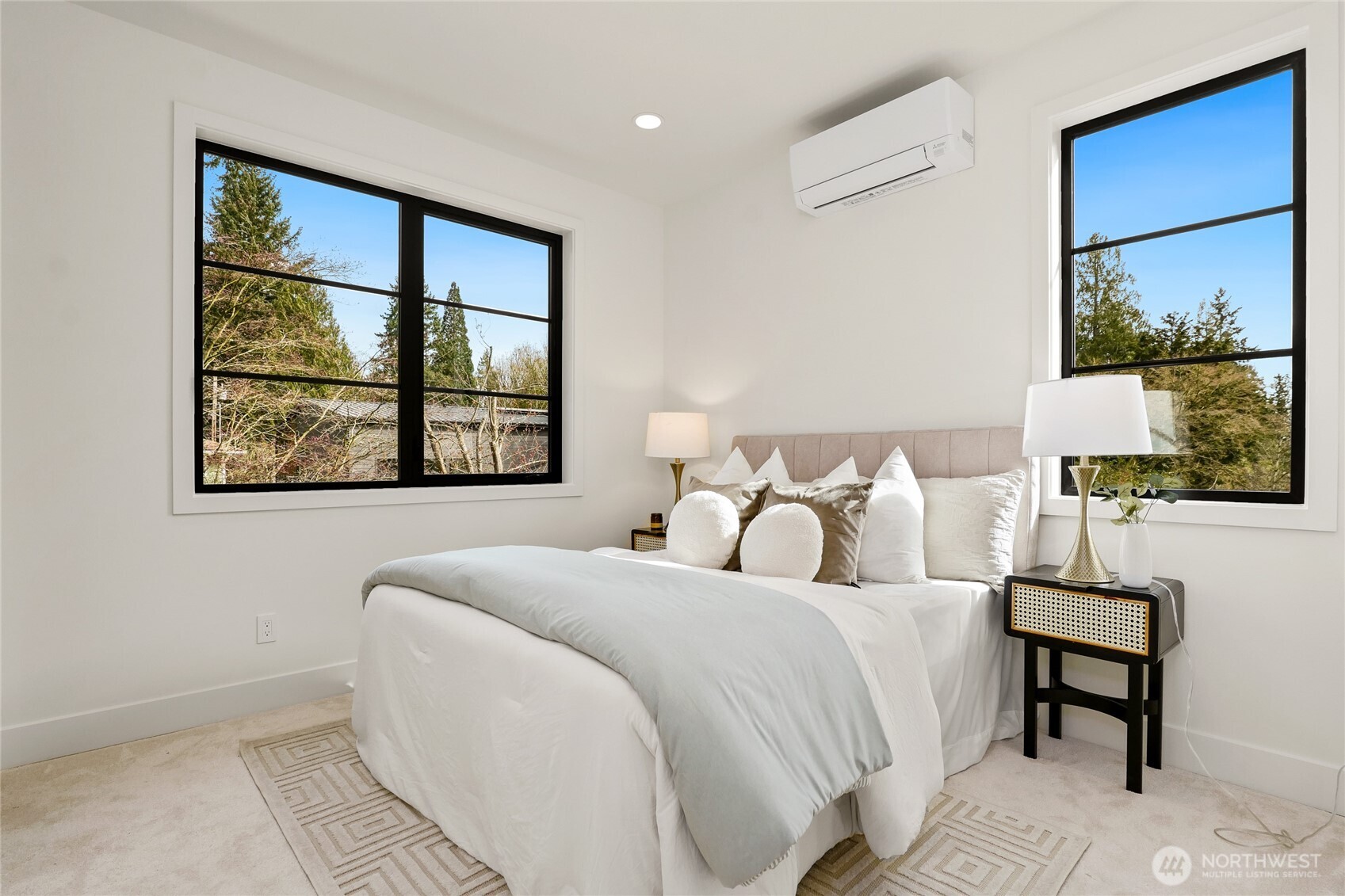 Second Upper Level Bedroom with oversized windows, seating area and heating/cooling