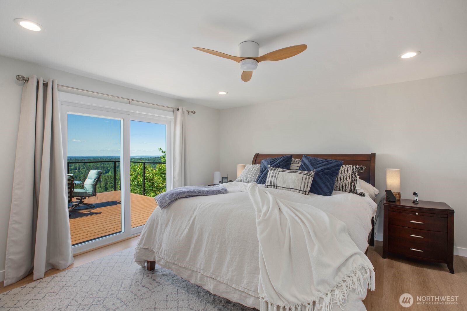 Another Sliding Glass Door in the Primary Bedroom to Access Your Private View Deck