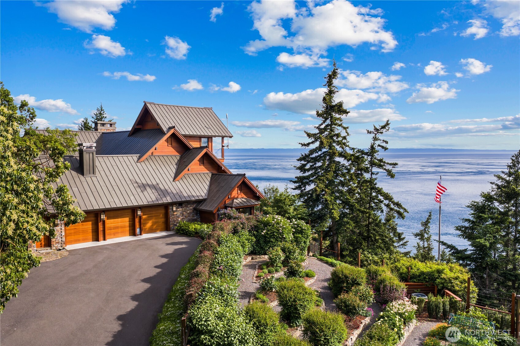 The main garage, showing the dramatic elevation of the Whale Watch Room and the formal cutting gardens to the North.