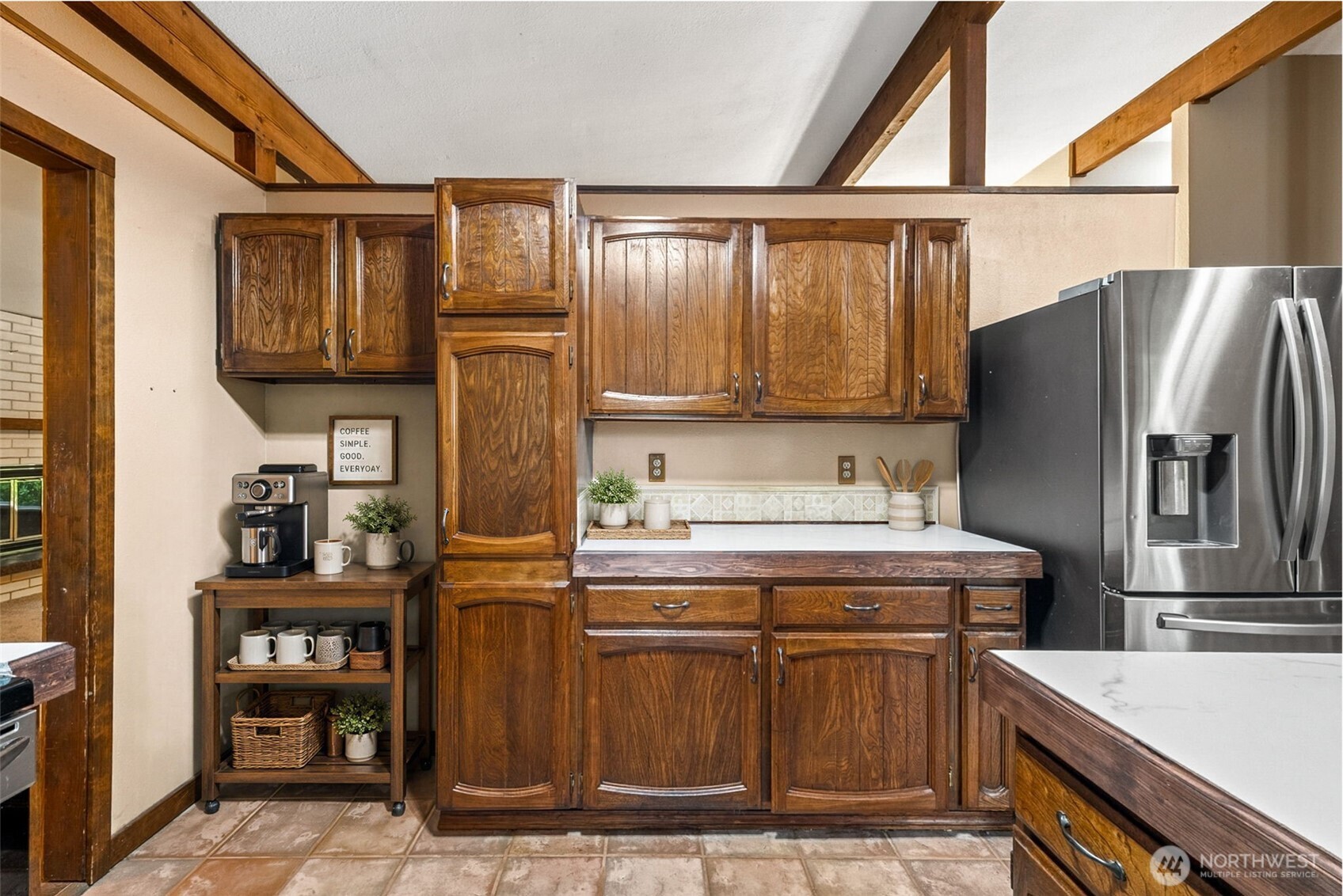 Looking towards the living room wall, good cabinet space for much storage.