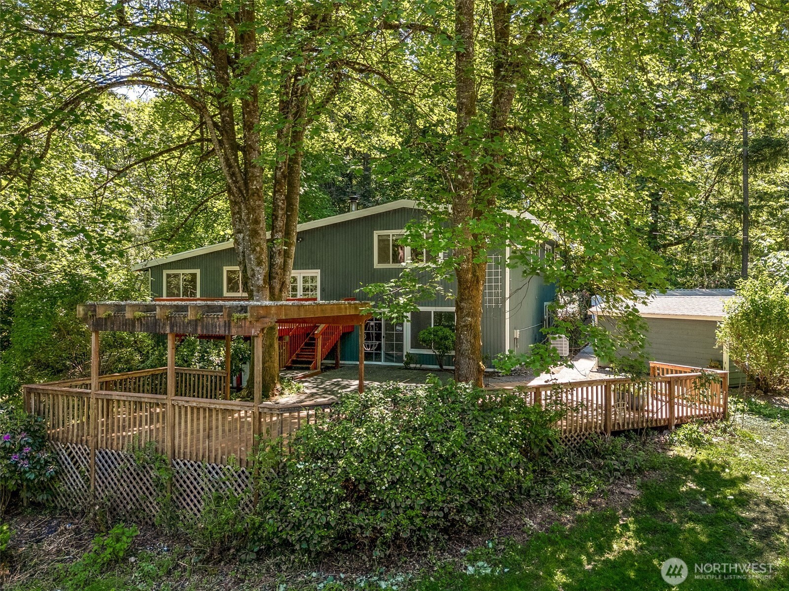 There is also a cement patio and then larger lower level back deck as well. Tons of outdoor space for all your summer entertaining!