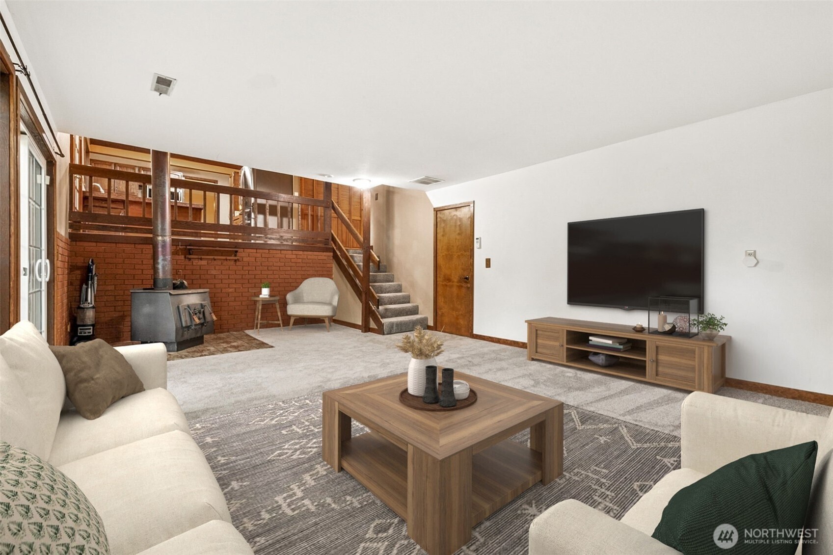 Another view of the family room with slider door leading to the back patio and deck.