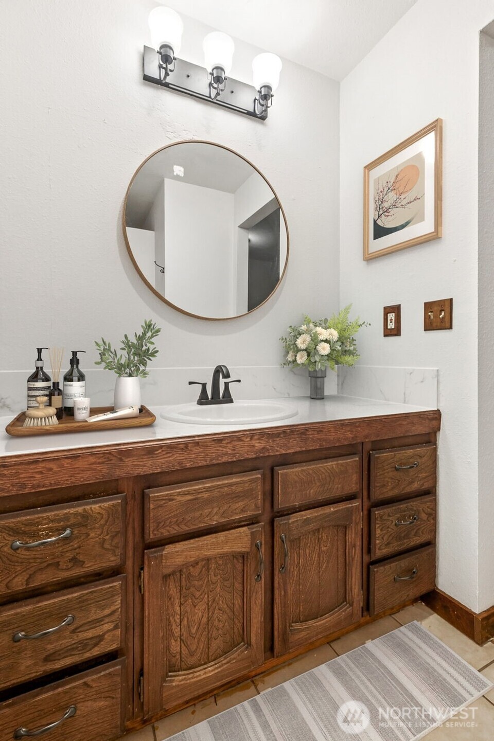 Separate sink and dressing area off the primary bedroom is perfect for allowing 2 people some of their own space.