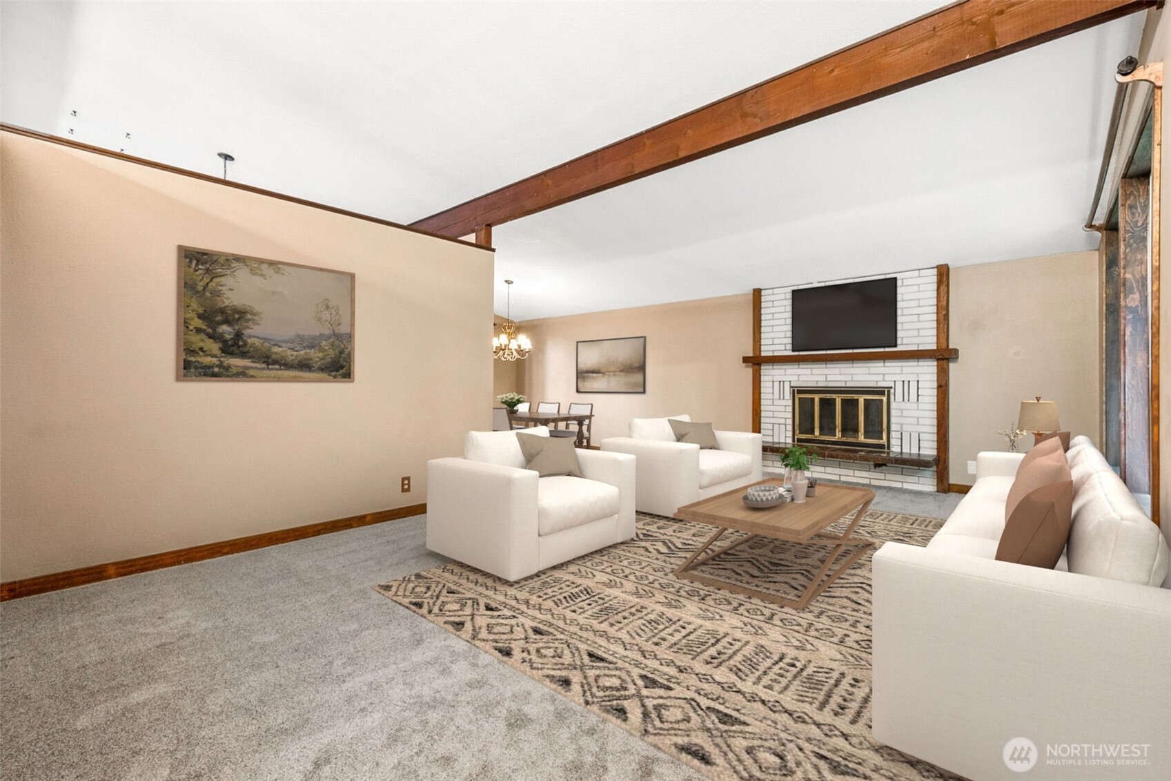 Plenty of room in this living room for many furniture configurations. Put the TV over the wood burning fireplace, or place the furniture different and use one of the living walls for a larger TV.