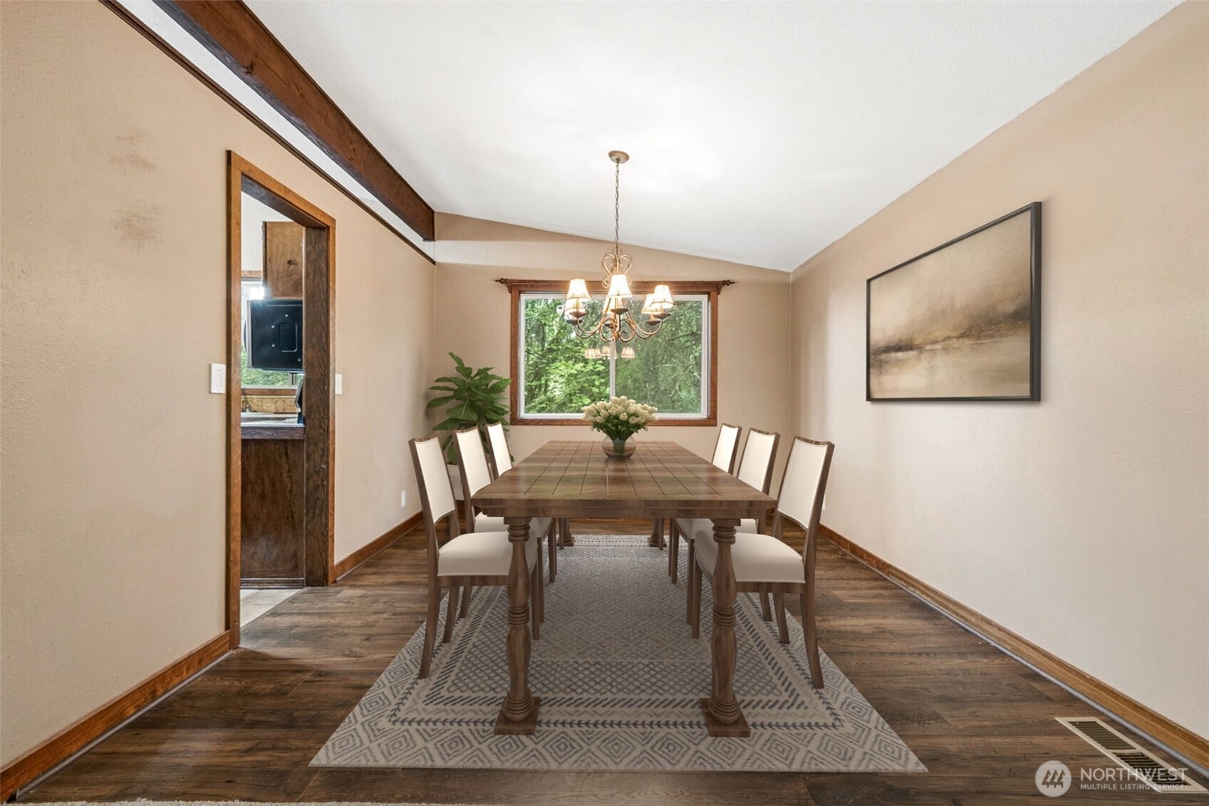 Dining room is large enough for an 8 to 10 person table.