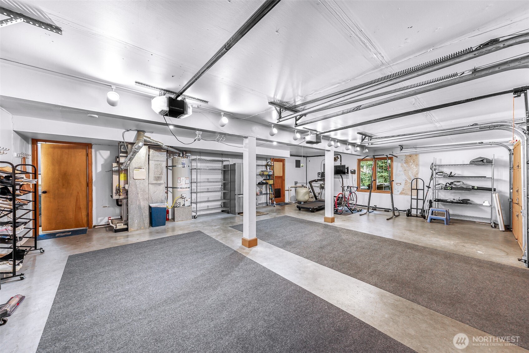 Three car large garage with storage space.