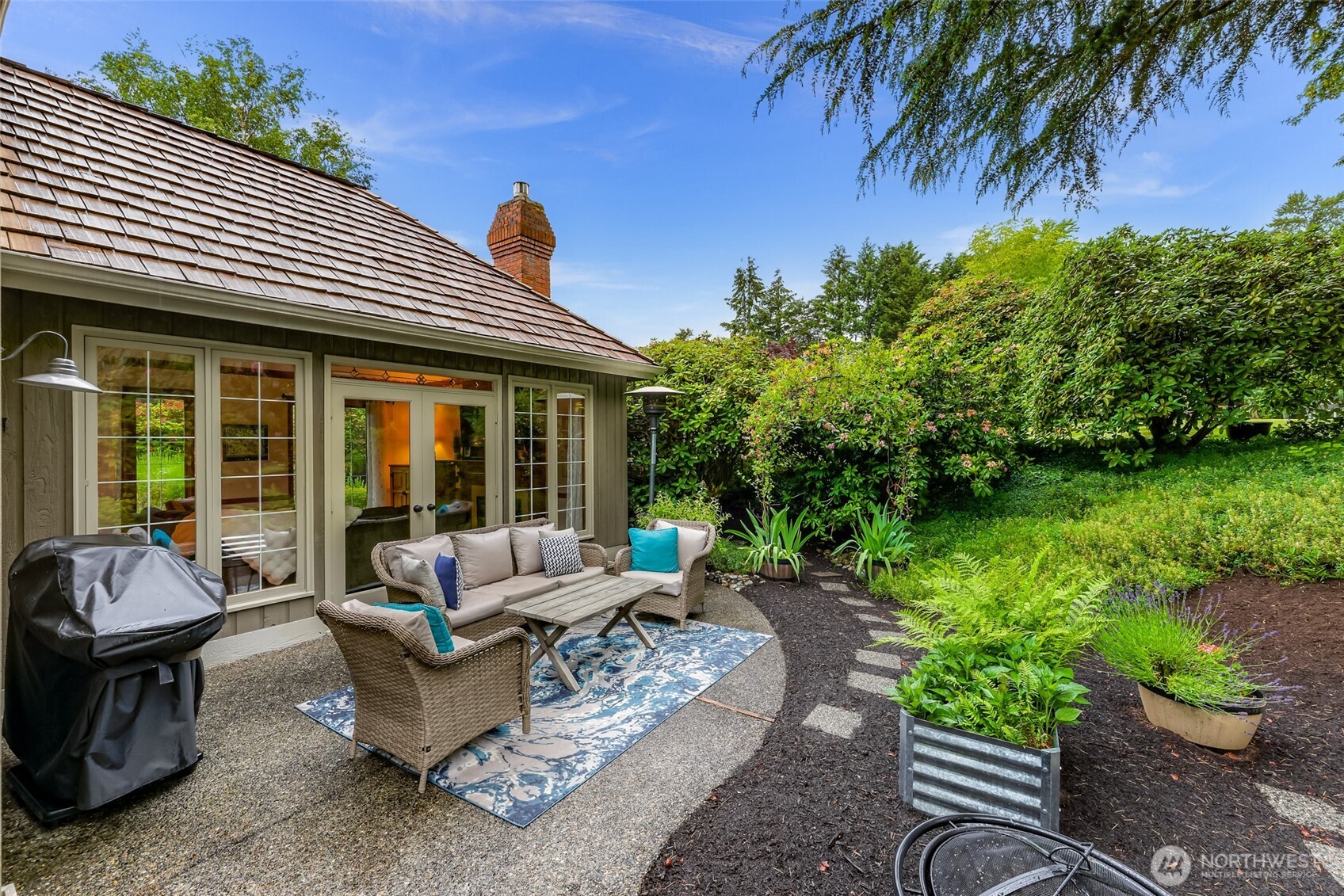 Living room opens to its own private patio.