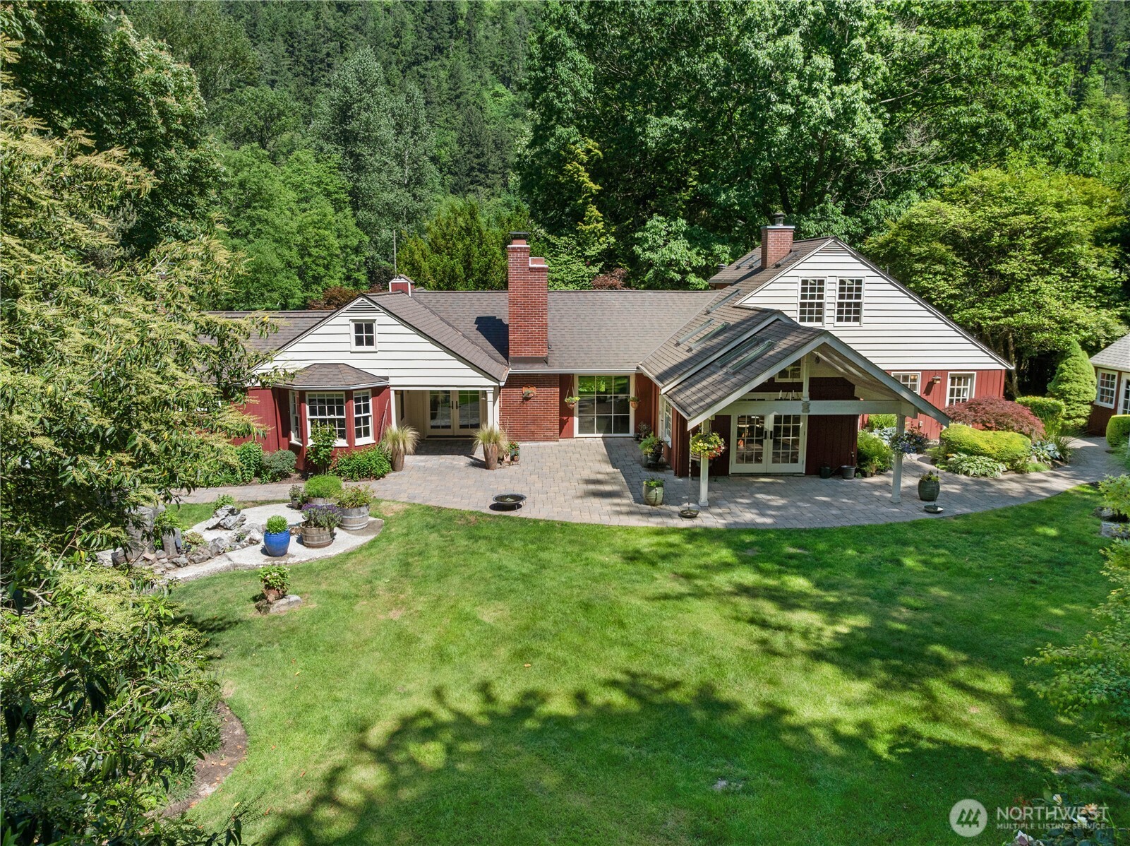 Beautiful back patio overlooking the perfectly manicured grounds.