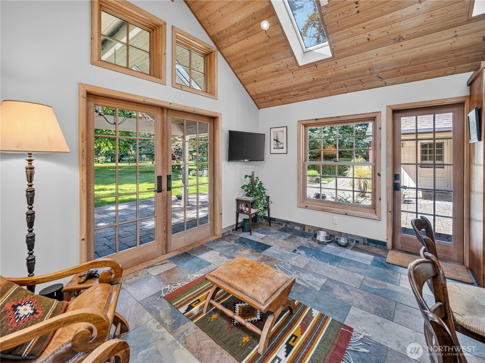 Vaulted Great Room room with heated & polished concrete floor.