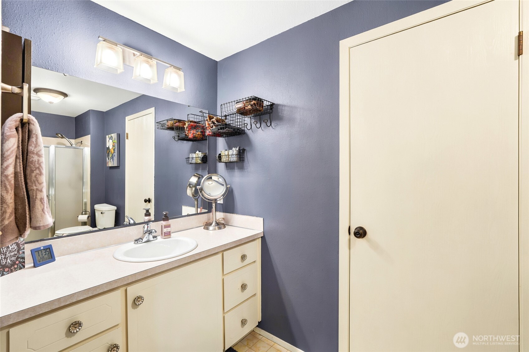 Primary bath with oversized counter space and shower