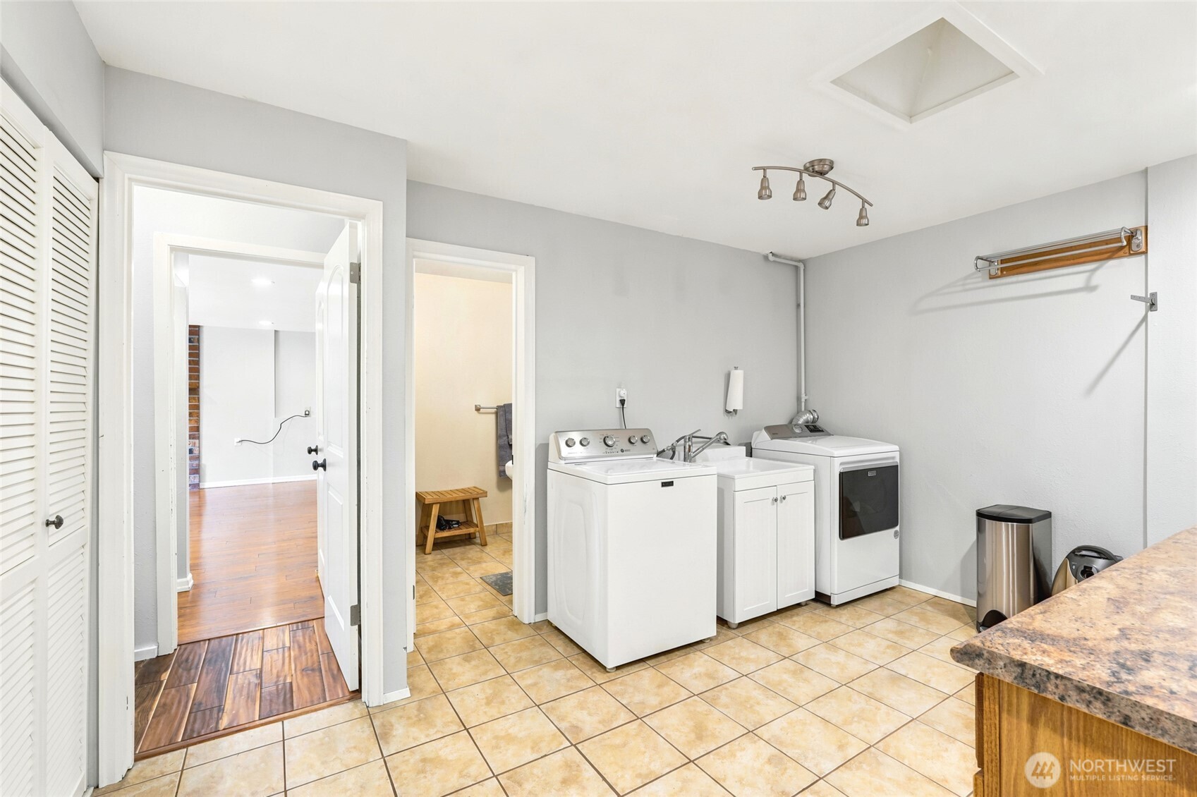 Oversized laundry room with plenty of storage.