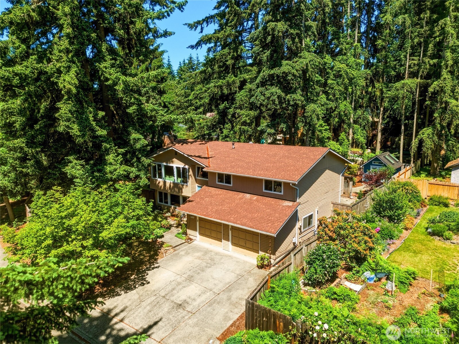 Beautiful mature trees surround the home (and neighborhood) for a cozy and nature vibe while still being close to amenities.