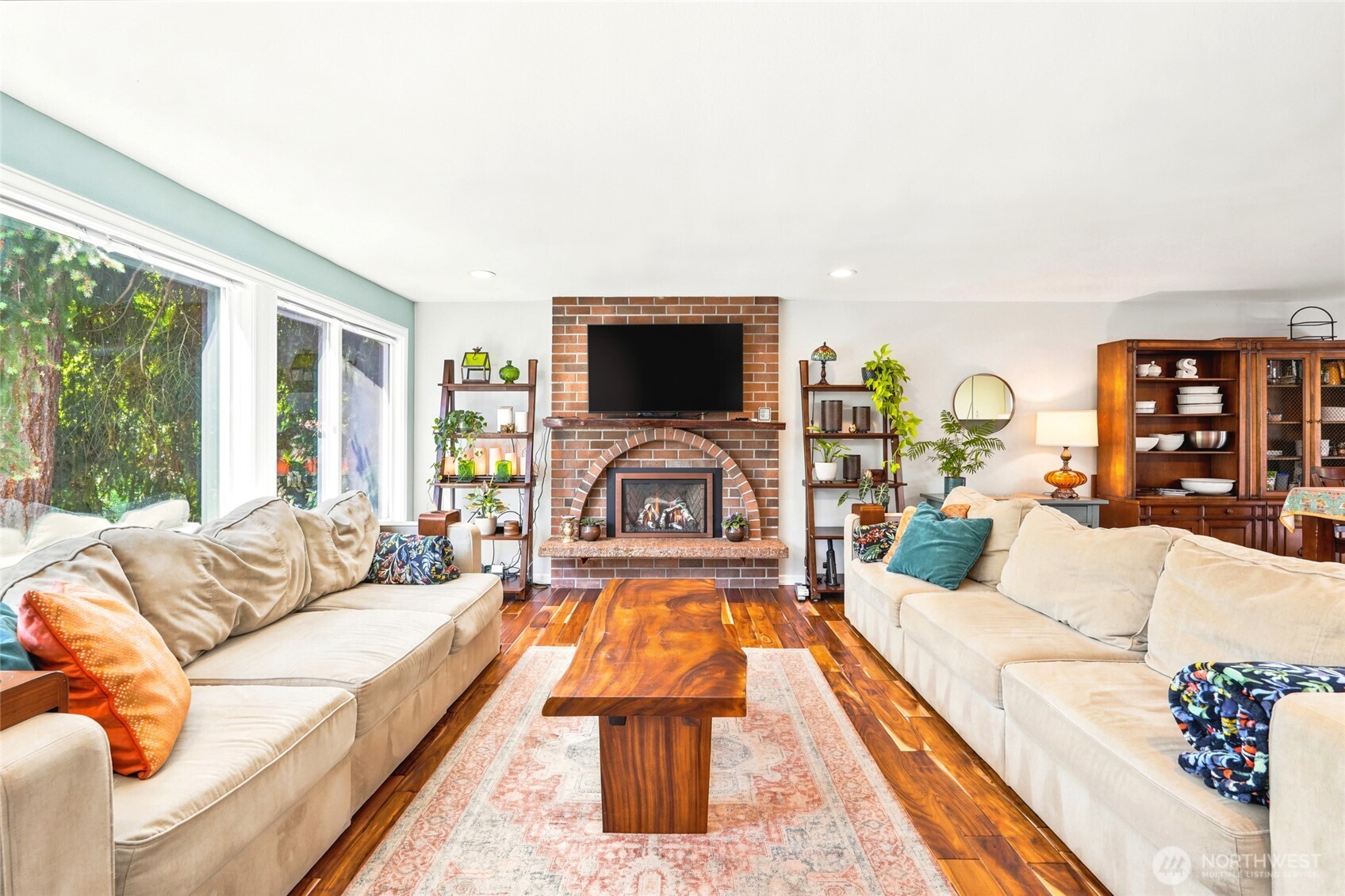 Original fire place with gas insert to maintain the character while providing convenience.
